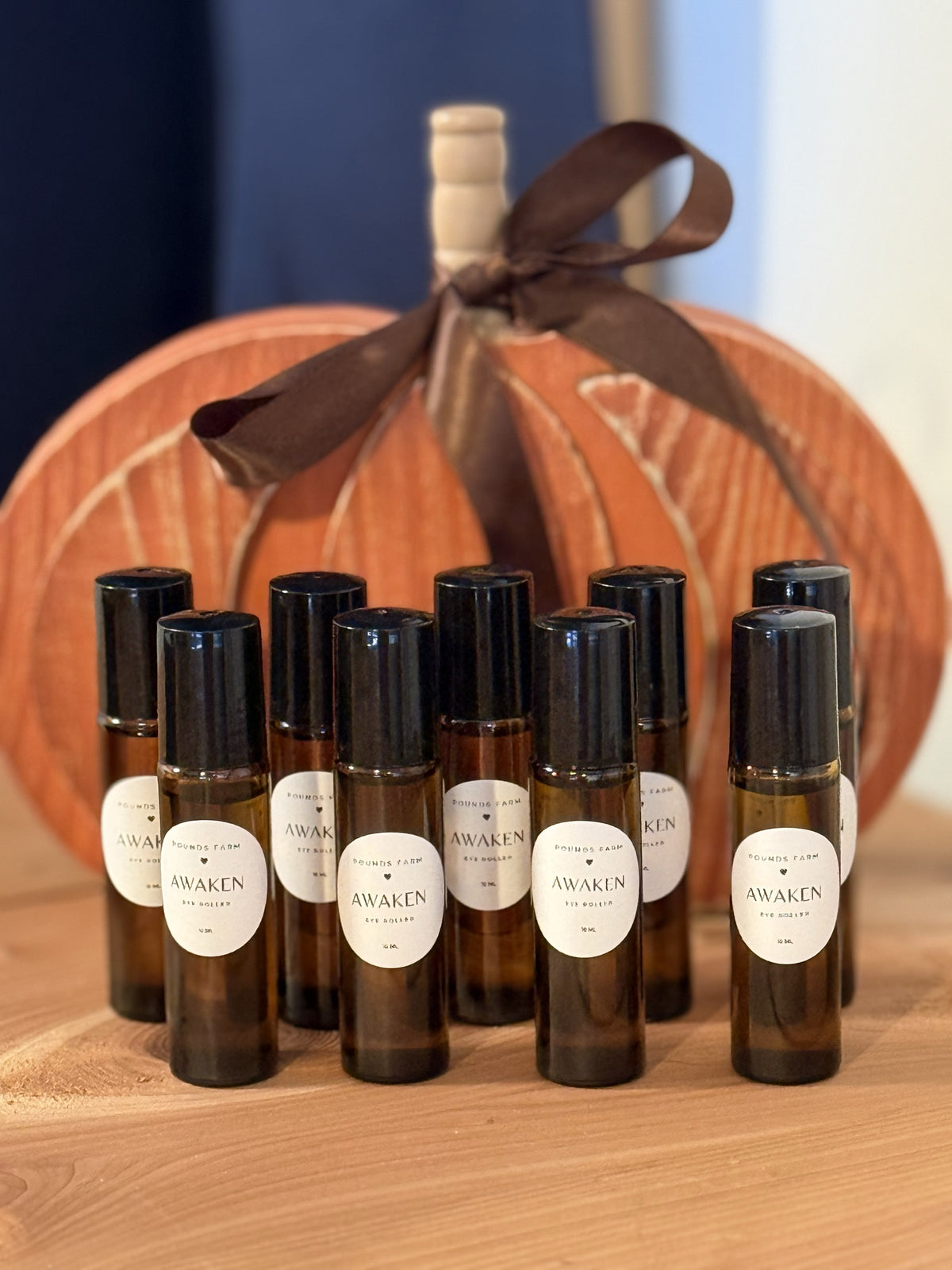 Pounds Farm Awaken Eye Roller — 10 ml amber glass rollers with cream oval labels